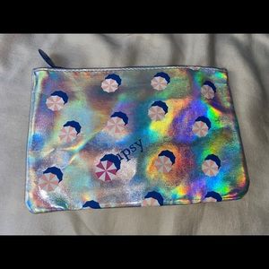 silver makeup bag with candy print